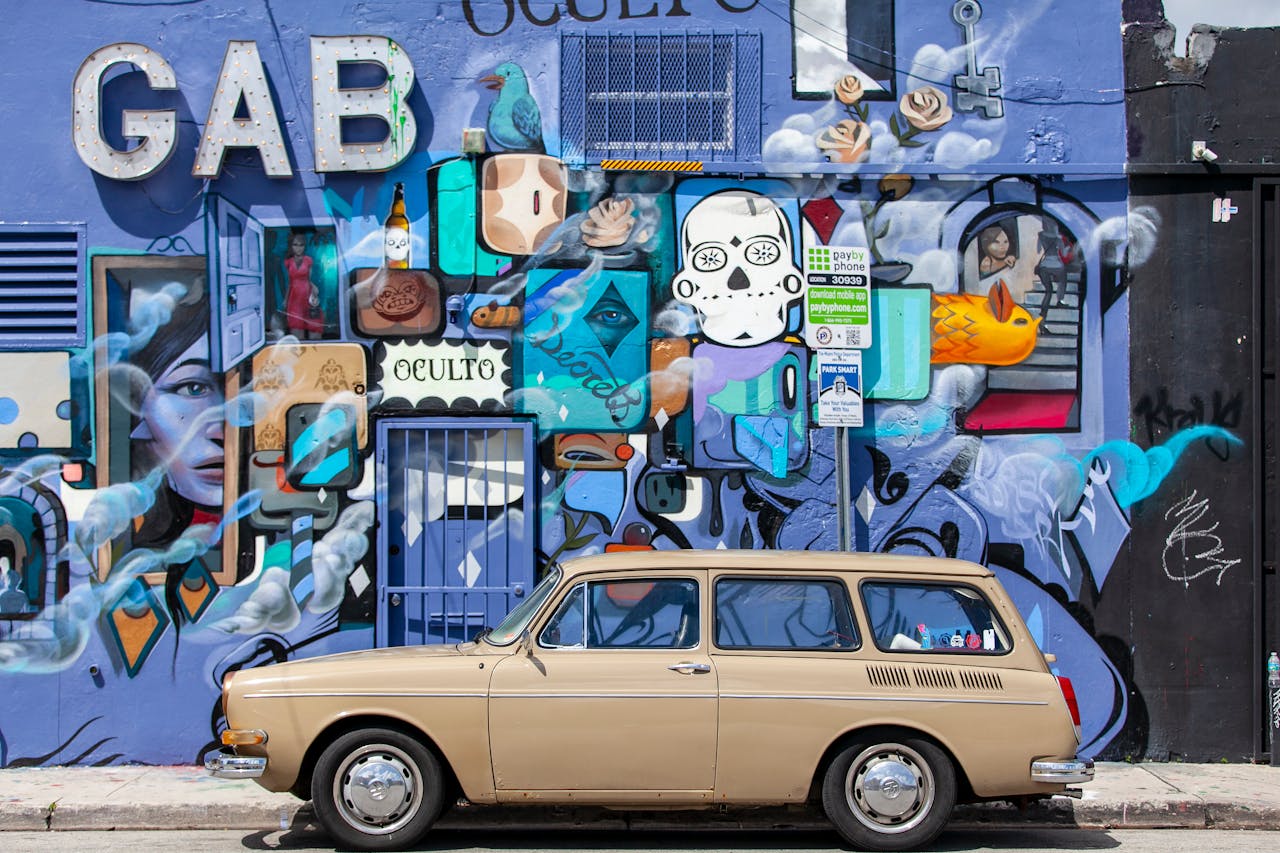 Photo of Vehicle Against a Graffiti